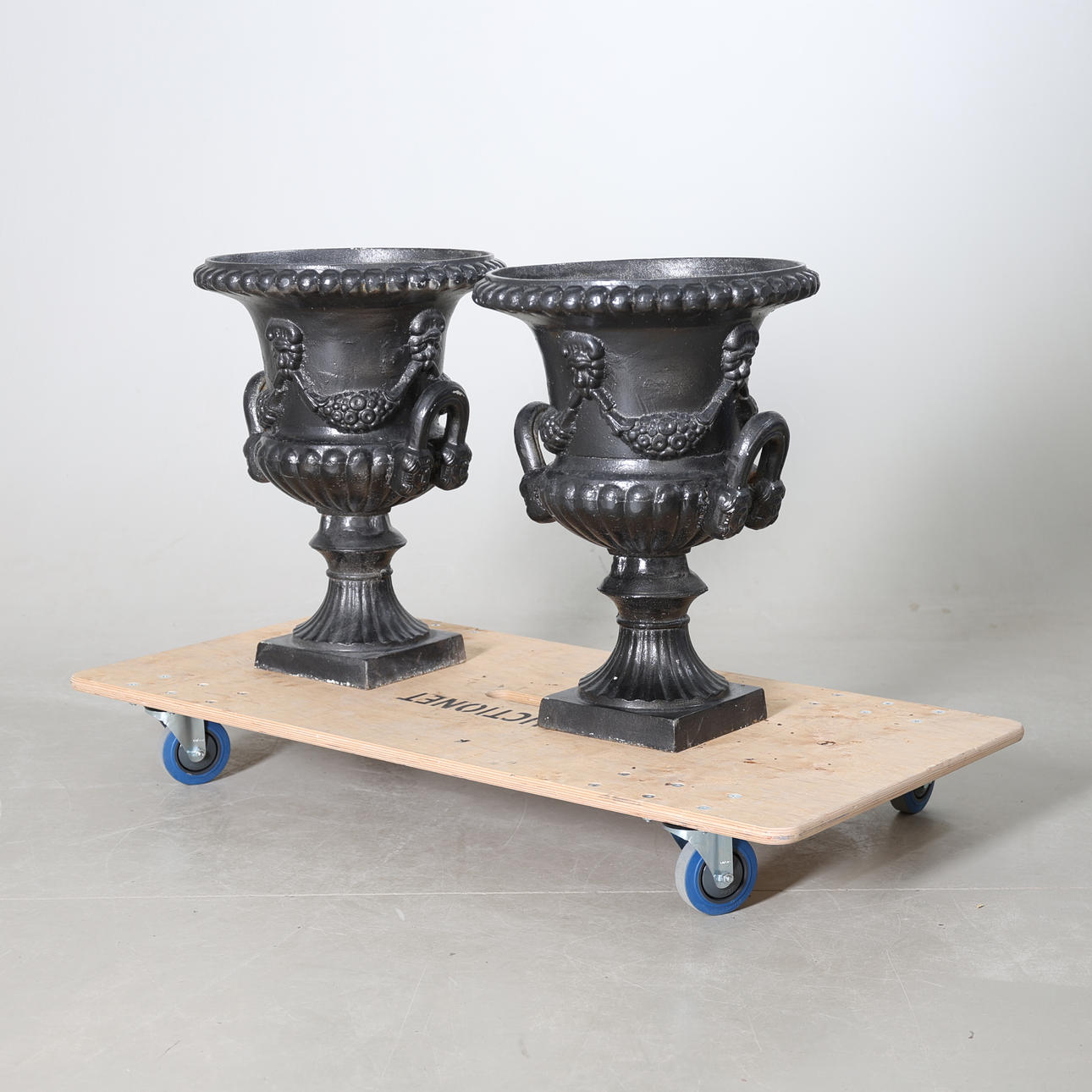 GARDEN URNS, a pair, cast iron.