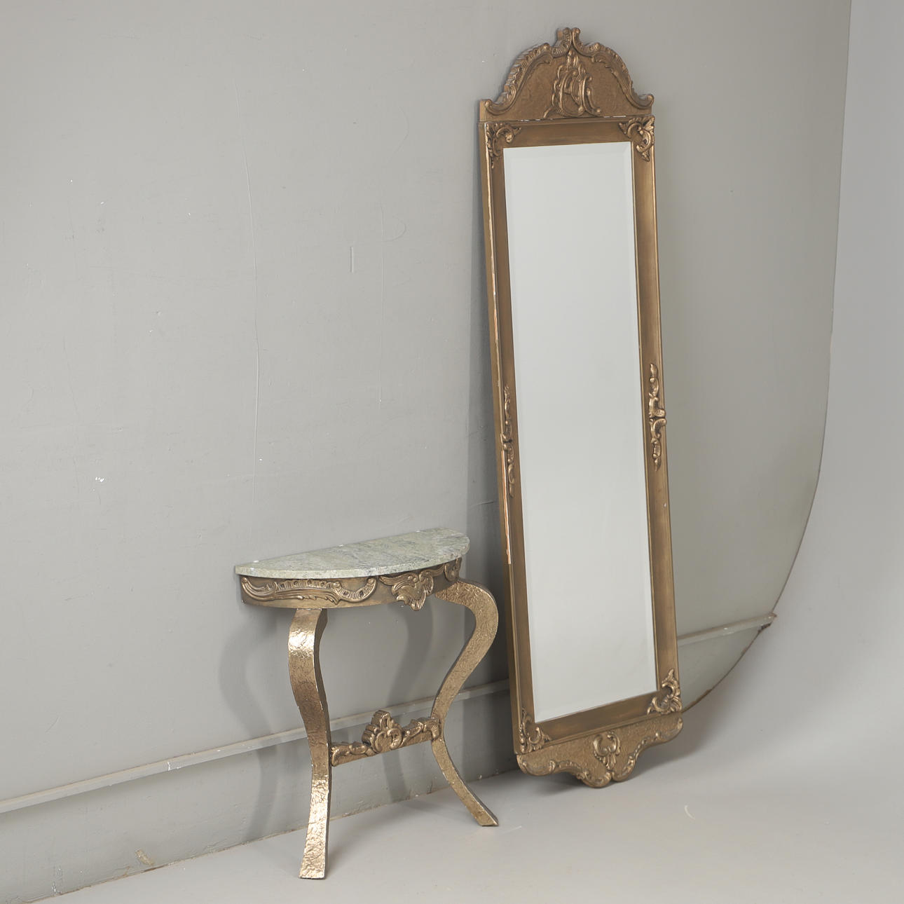 MIRROR WITH CONSOLE TABLE, bronzed frame/stone top, rococo style.