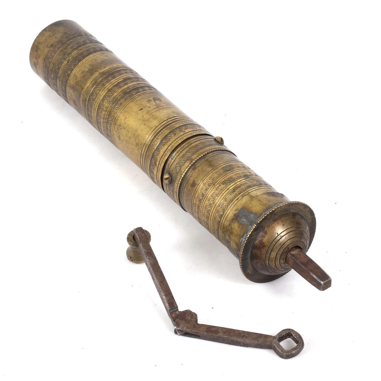 An oriental brass coffee grinder, 20th century.