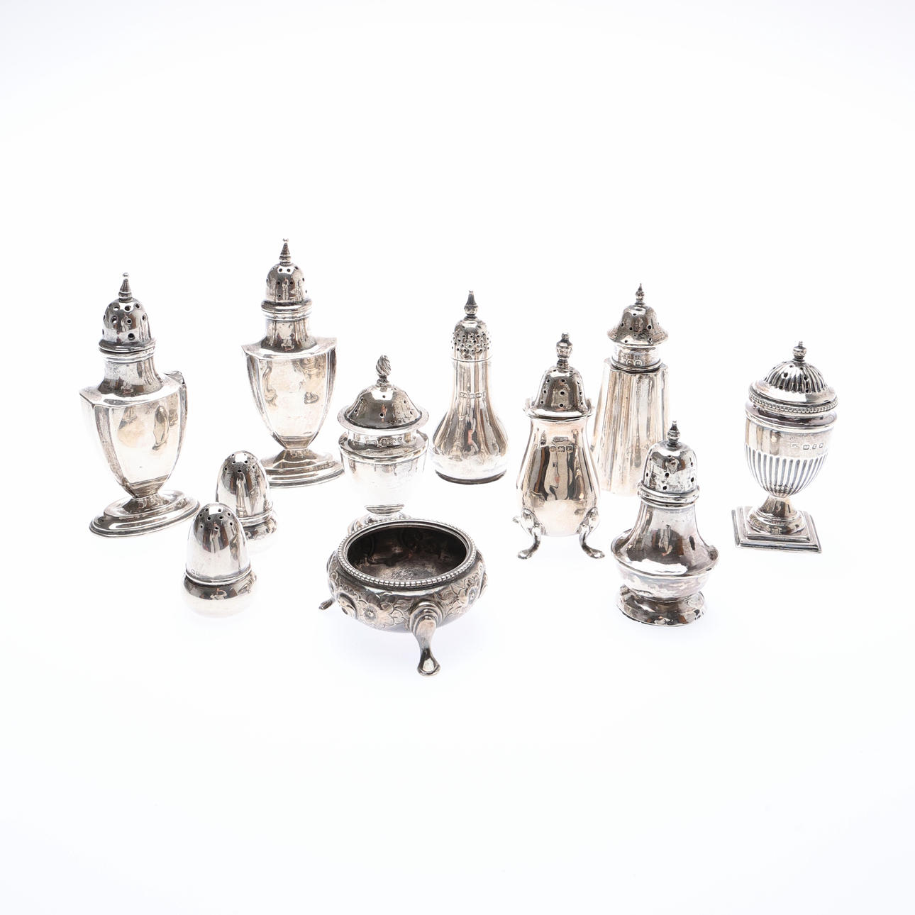 VICTORIAN SILVER SALT CELLAR, AND 10 PEPPER POTS. (11).