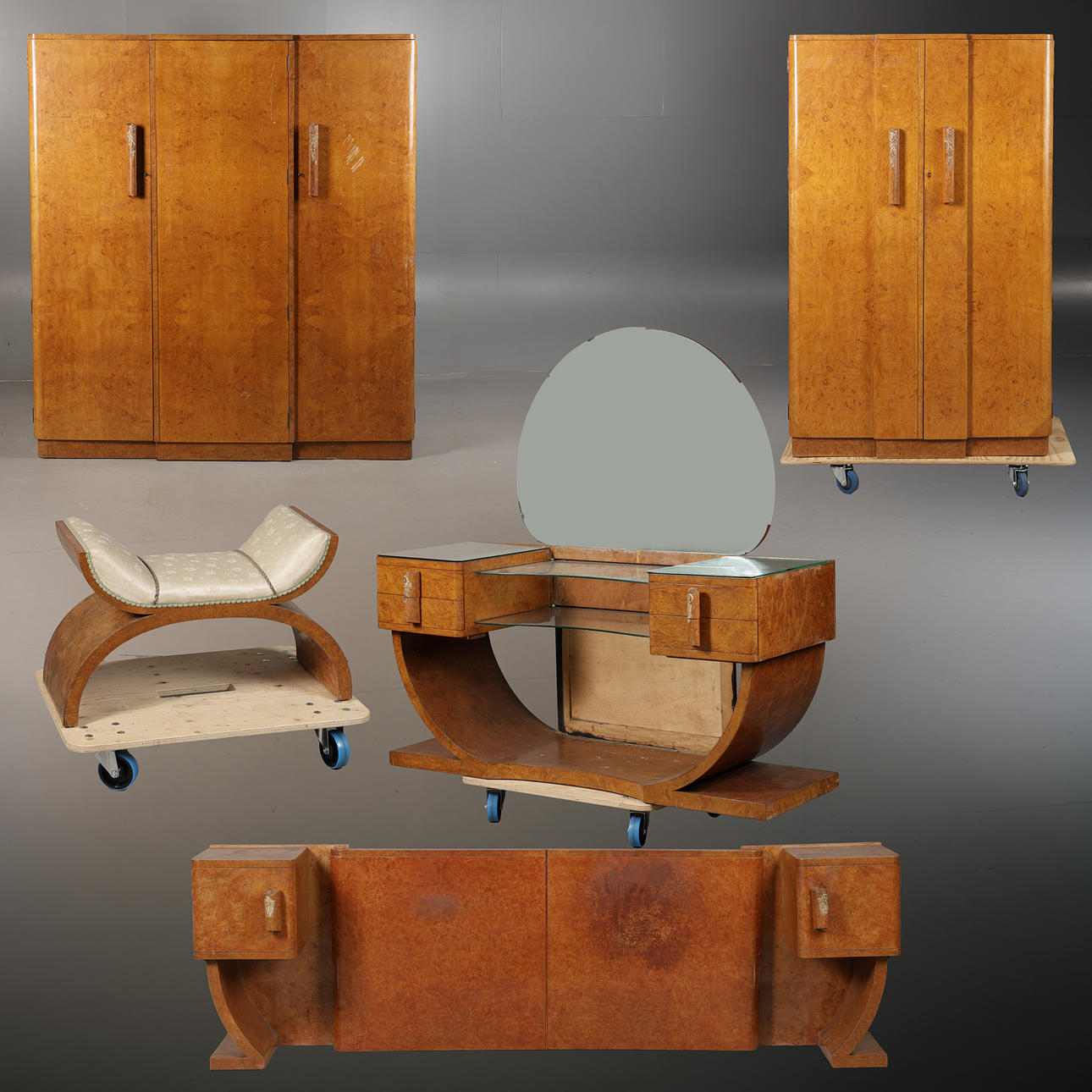 AN ART DECO MAPLE VENEERED BEDROOM SUITE.