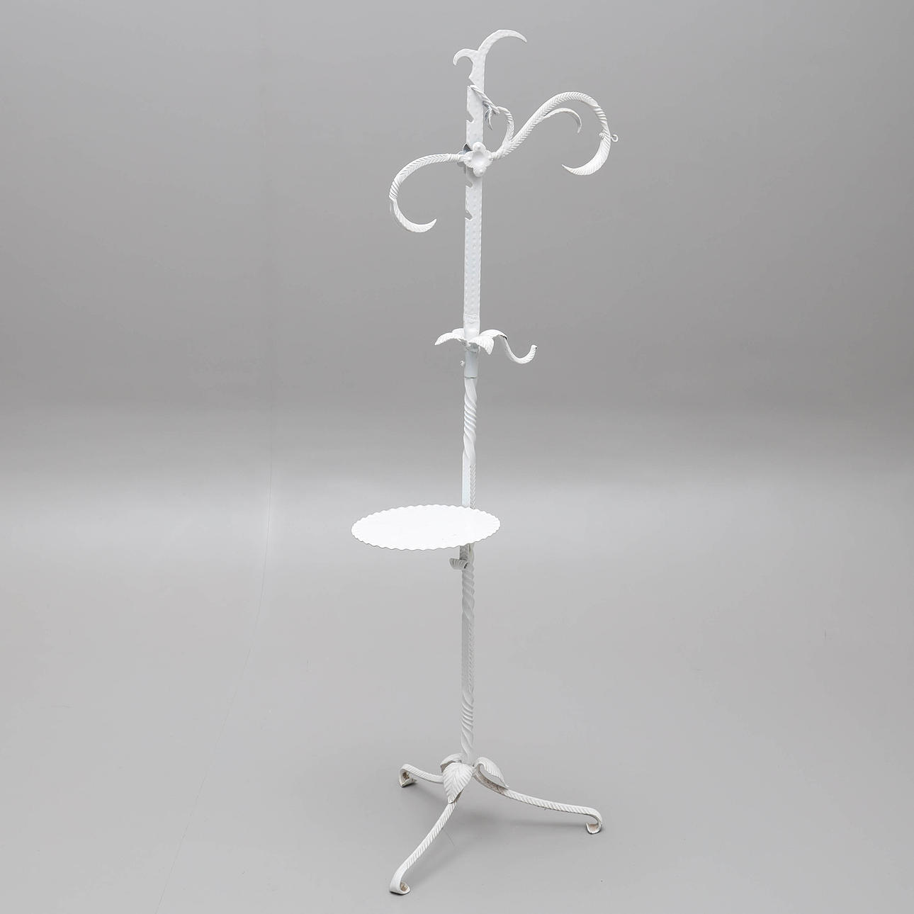 A lacquered metal flower table, 20th century.