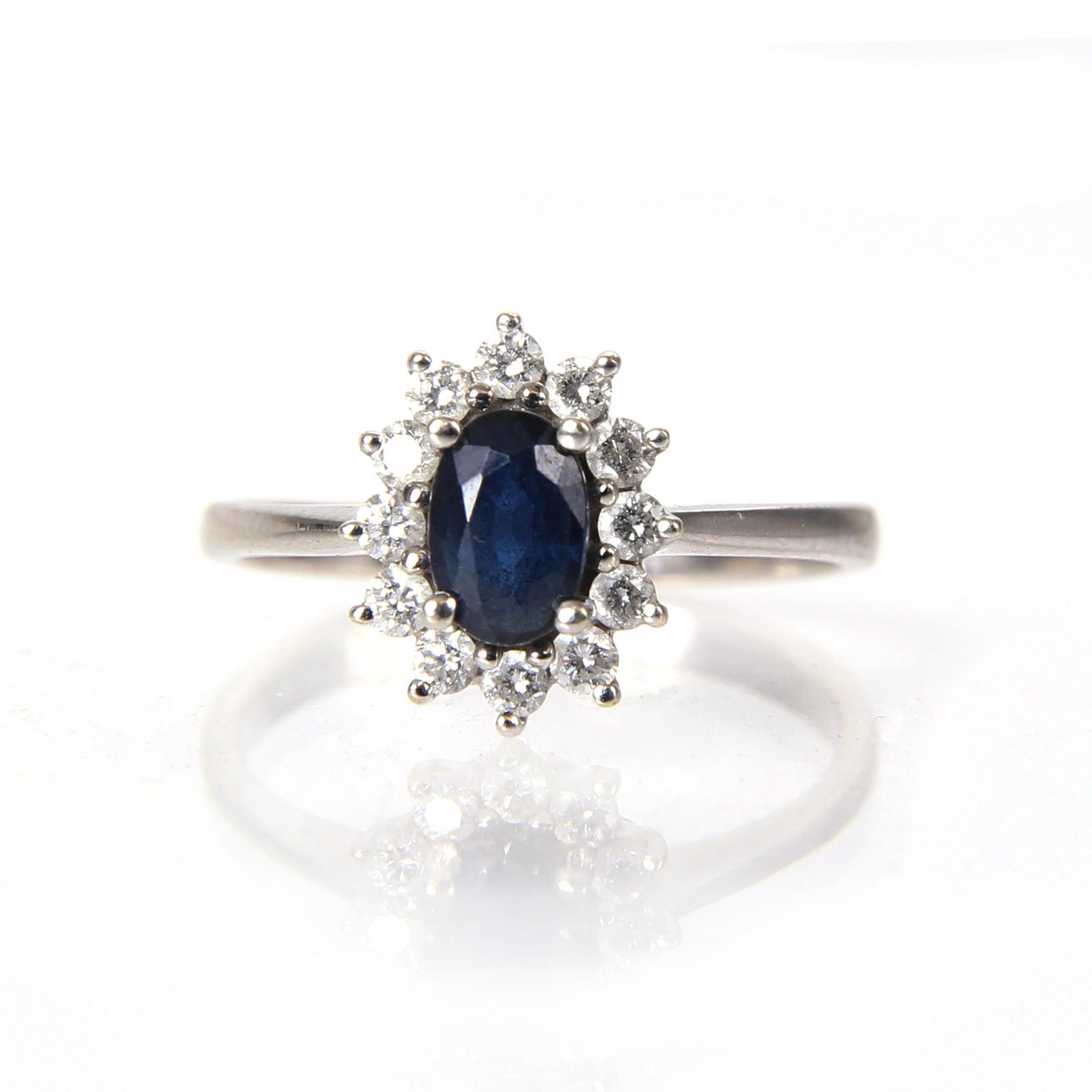 Rosette ring with sapphire and diamonds.