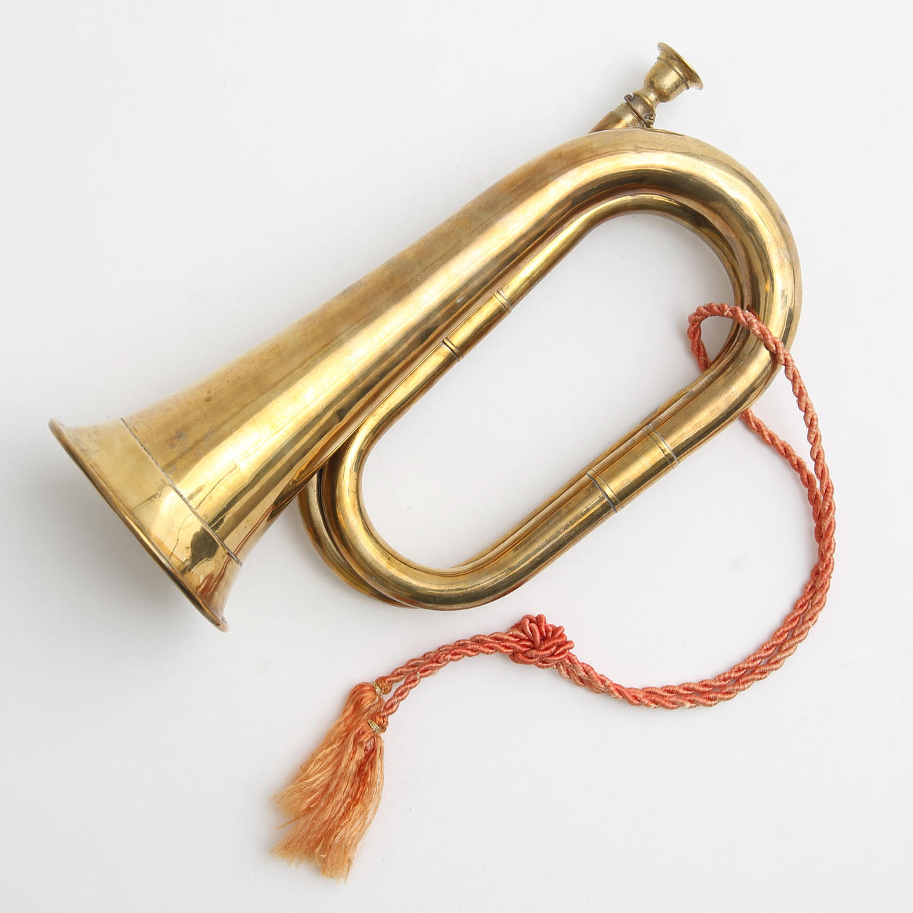 A brass hunting horn.