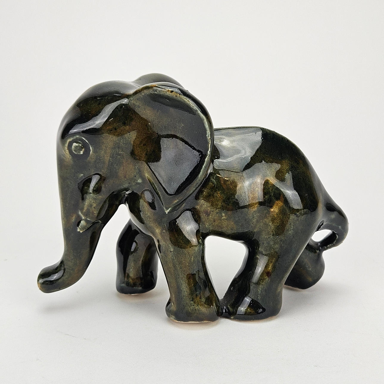 A ceramic figurine, elephant, unsigned.