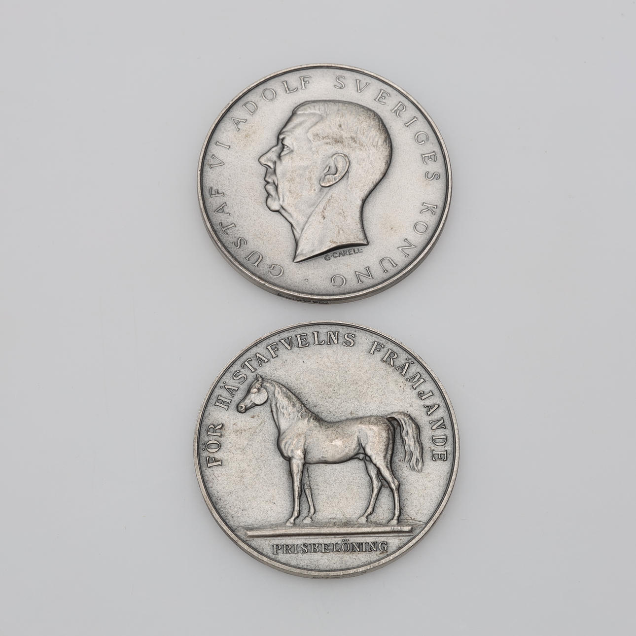 MEDALJER 2 stycken silver vikt ca 62,8 gram.