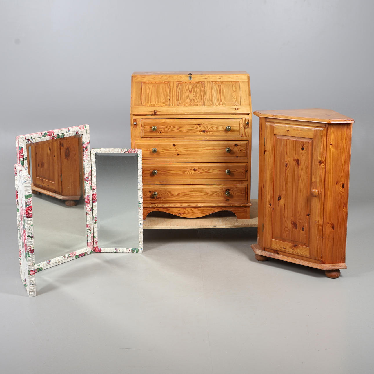 A MODERN PINE BUREAU, CORNER CUPBOARD AND DRESSING TABLE MIRROR.