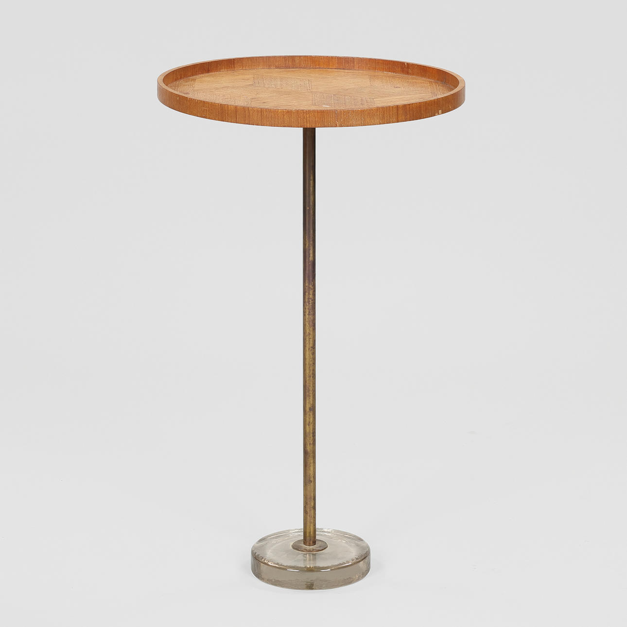 Teak, brass and glass side table, circa 1950s.