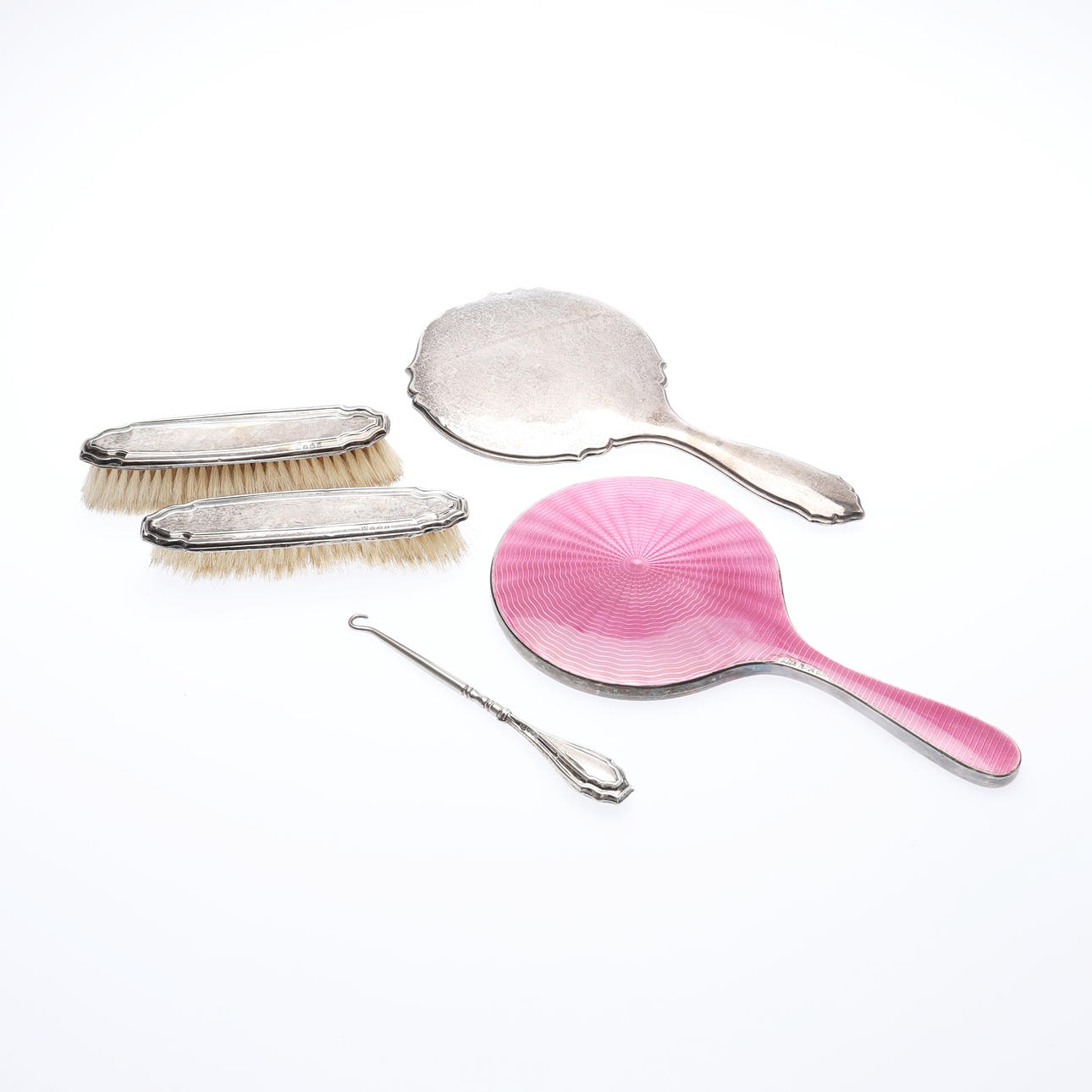 2 SILVER MOUNTED HAND MIRRORS, 2 BRUSHES, AND A BUTTON HOOK. (5).