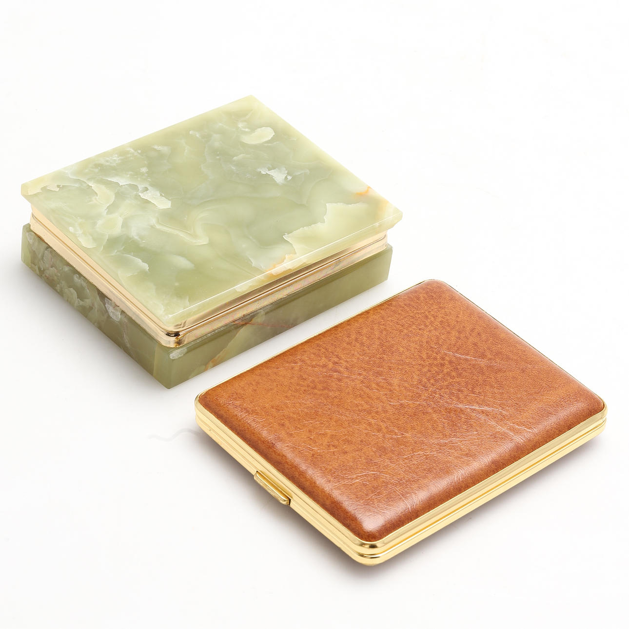 BOX AND CIGARETTE CASE, including onyx. Mid 20th century.