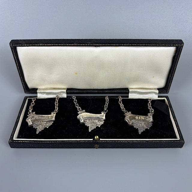SILVER HALLMARKED DECANTER LABLES.