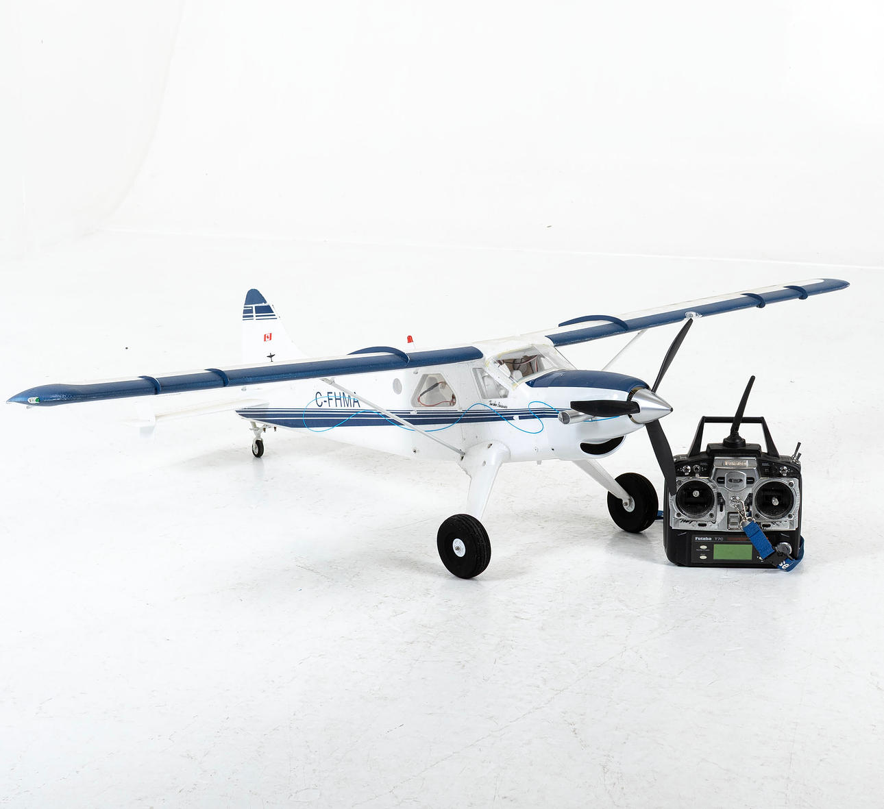 R/C MODEL AIRPLANE, with controller, Styrofoam, C-FHMA.