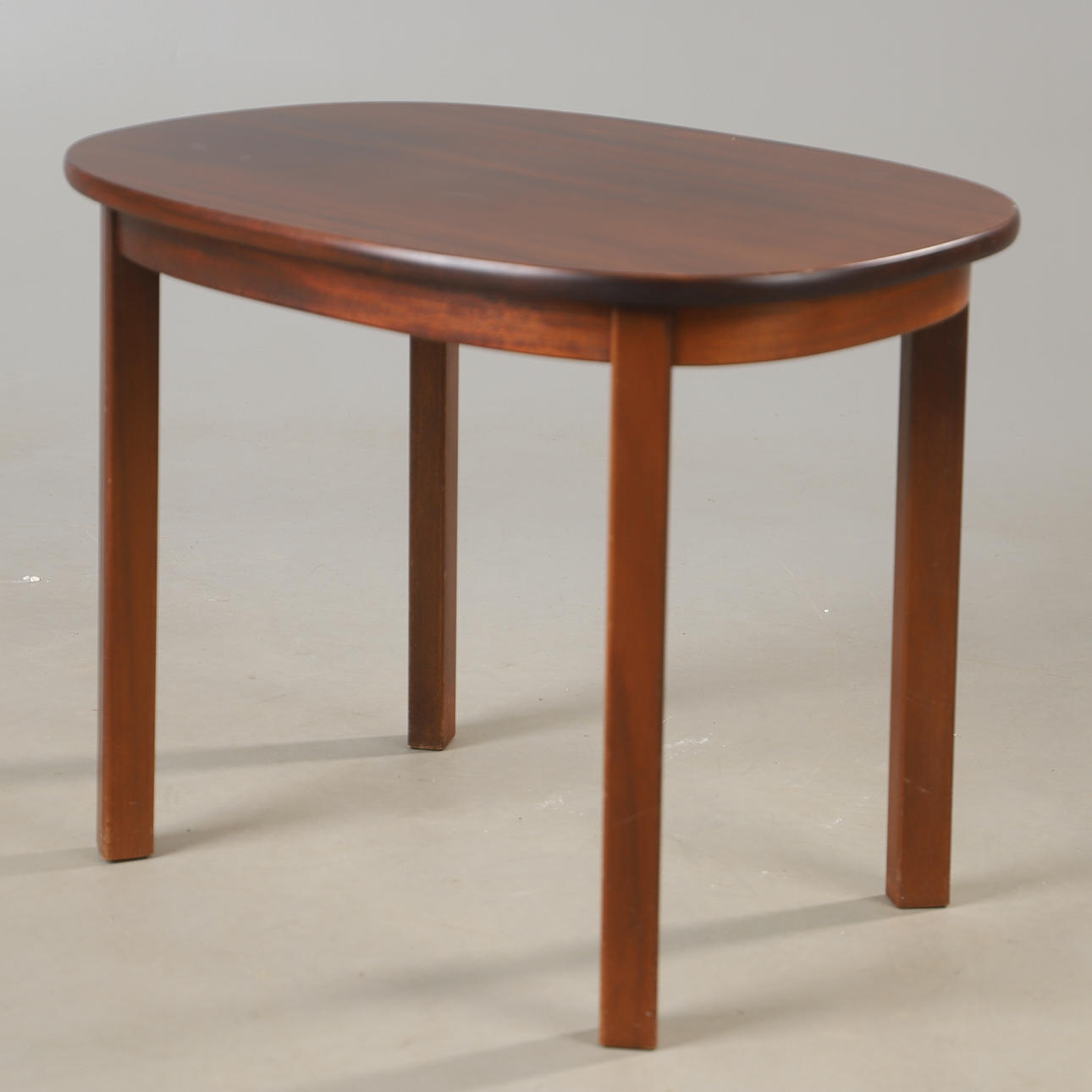 A mahogany side table, second half of the 20th century.