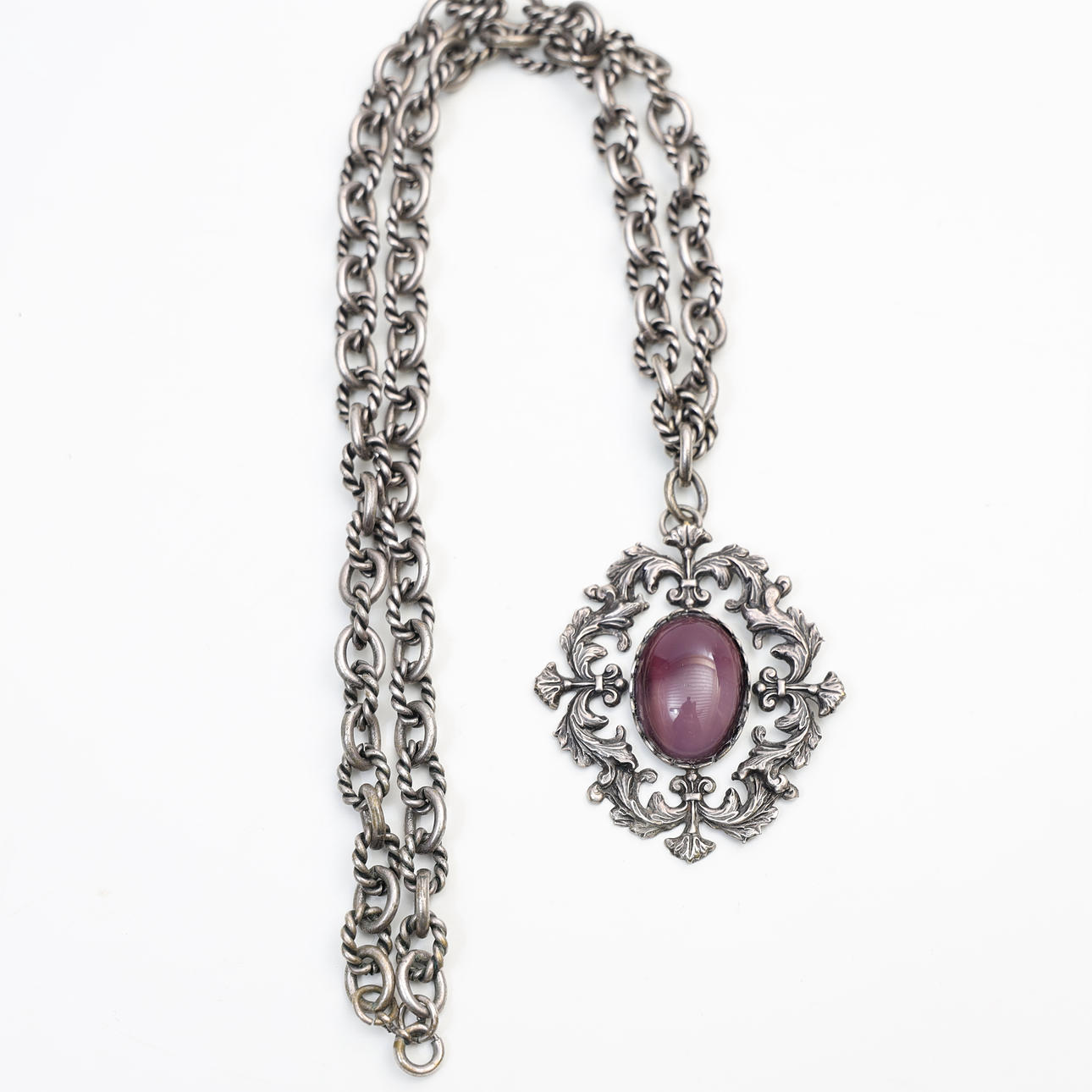 NECKLACE WITH PENDANT, possibly silver.