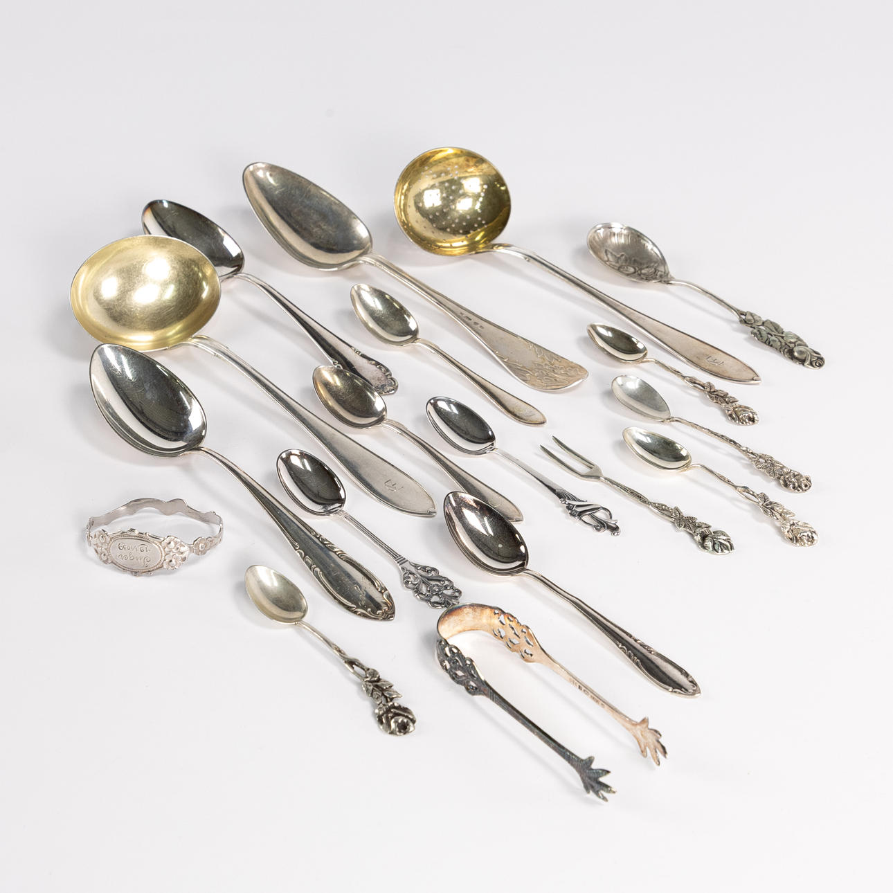 SILVER ITEMS. 18 pieces, mostly cutlery.
