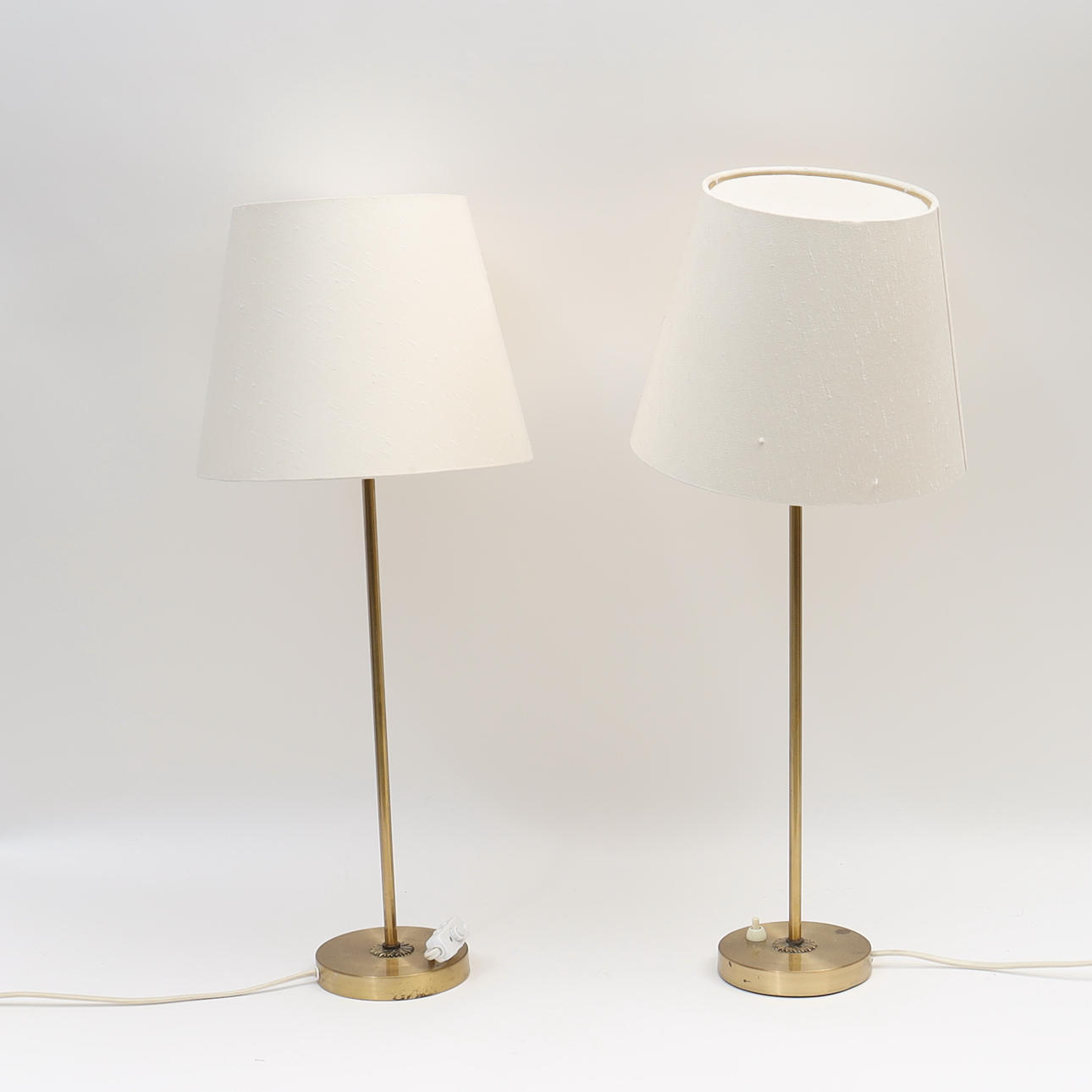TABLE LAMPS A PAIR, Boréns, Brass with textile shades.