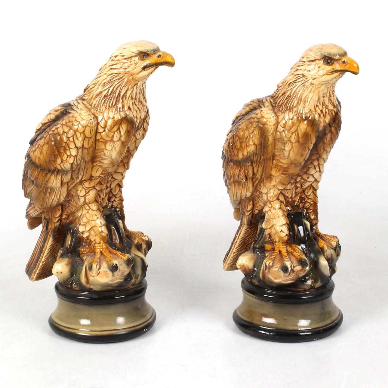 TWO SCULPTURES, eagles, patinated plaster, 20th century.