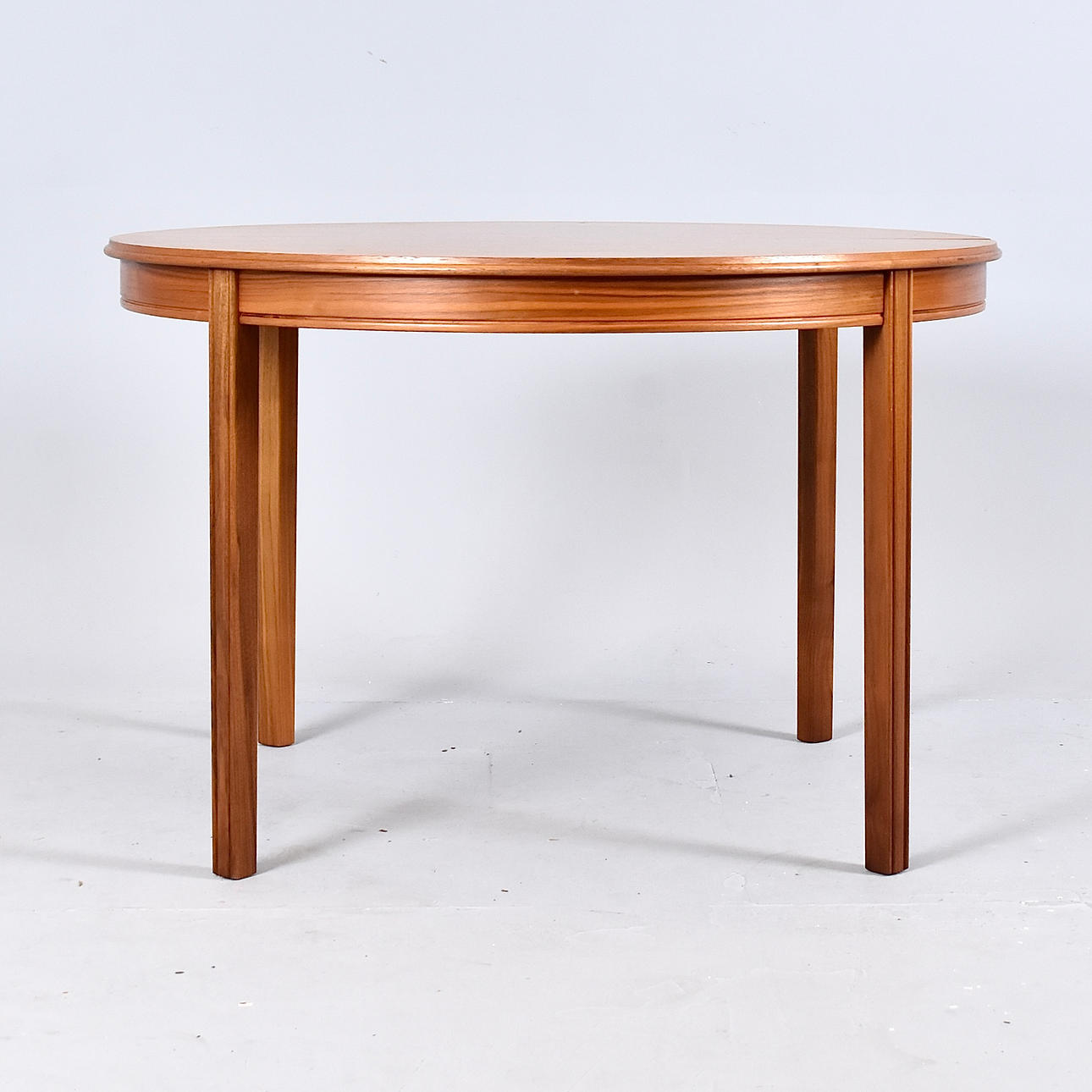 A teak dining table, 1960s/70s.