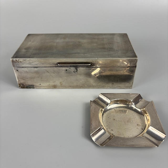 SILVER HALLMARKED CIGARETTE BOX AND ASH TRAY.