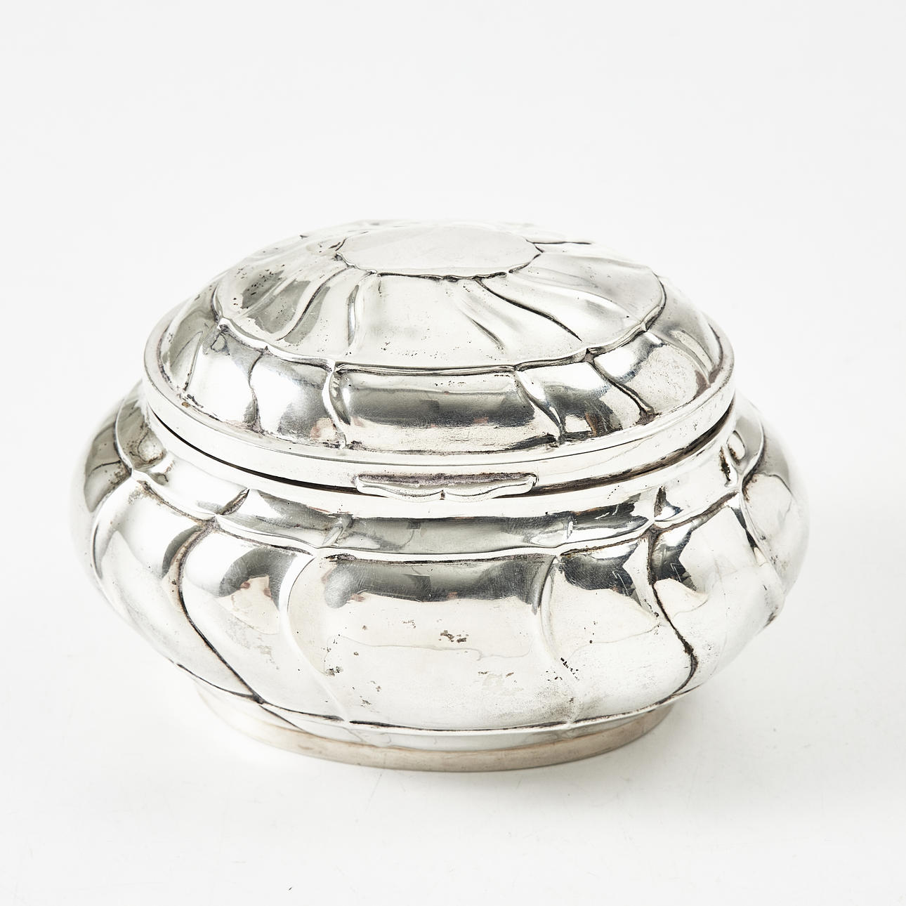 A silver sugar box, 20th century, rococo style.