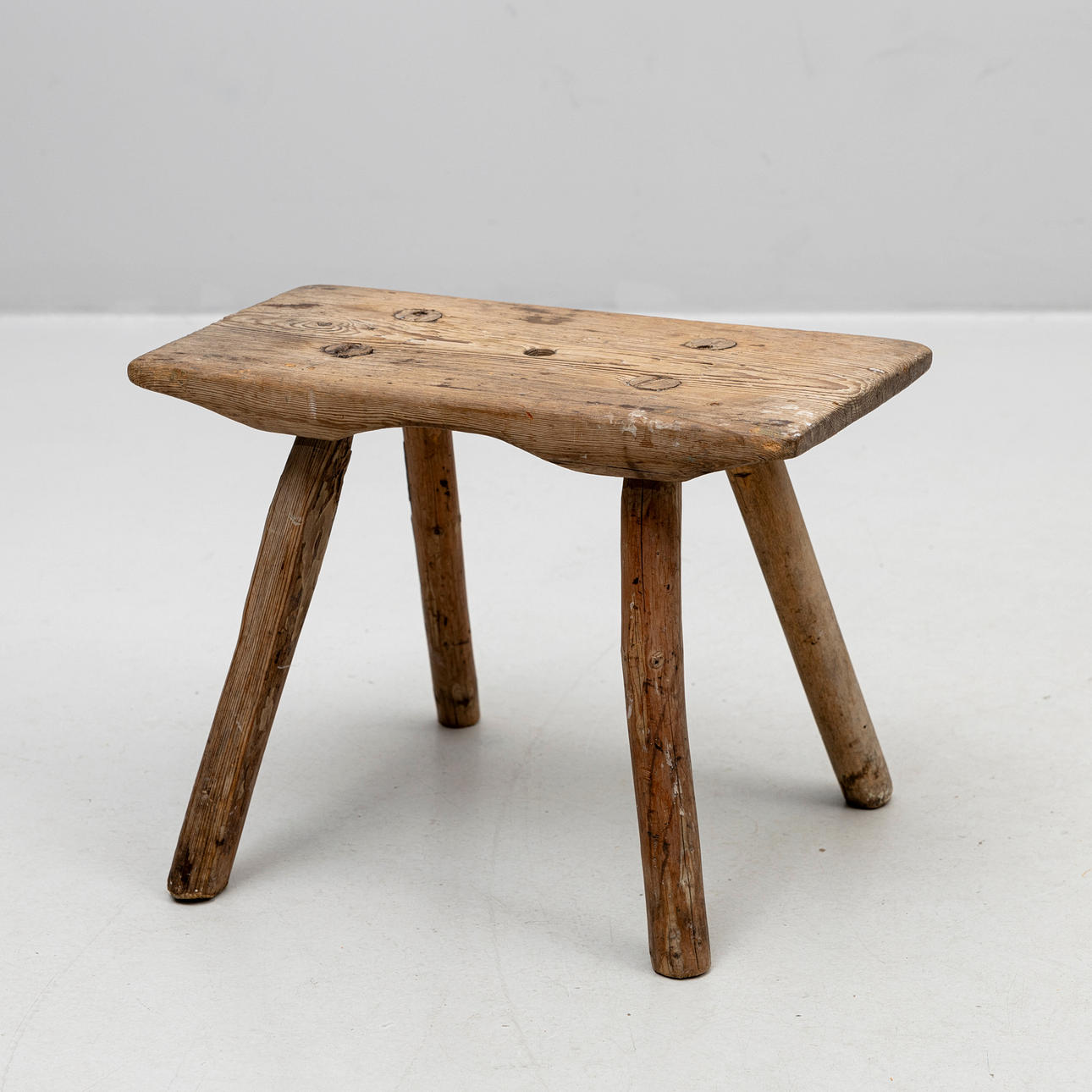 An 18th/20th century pine milk stool.