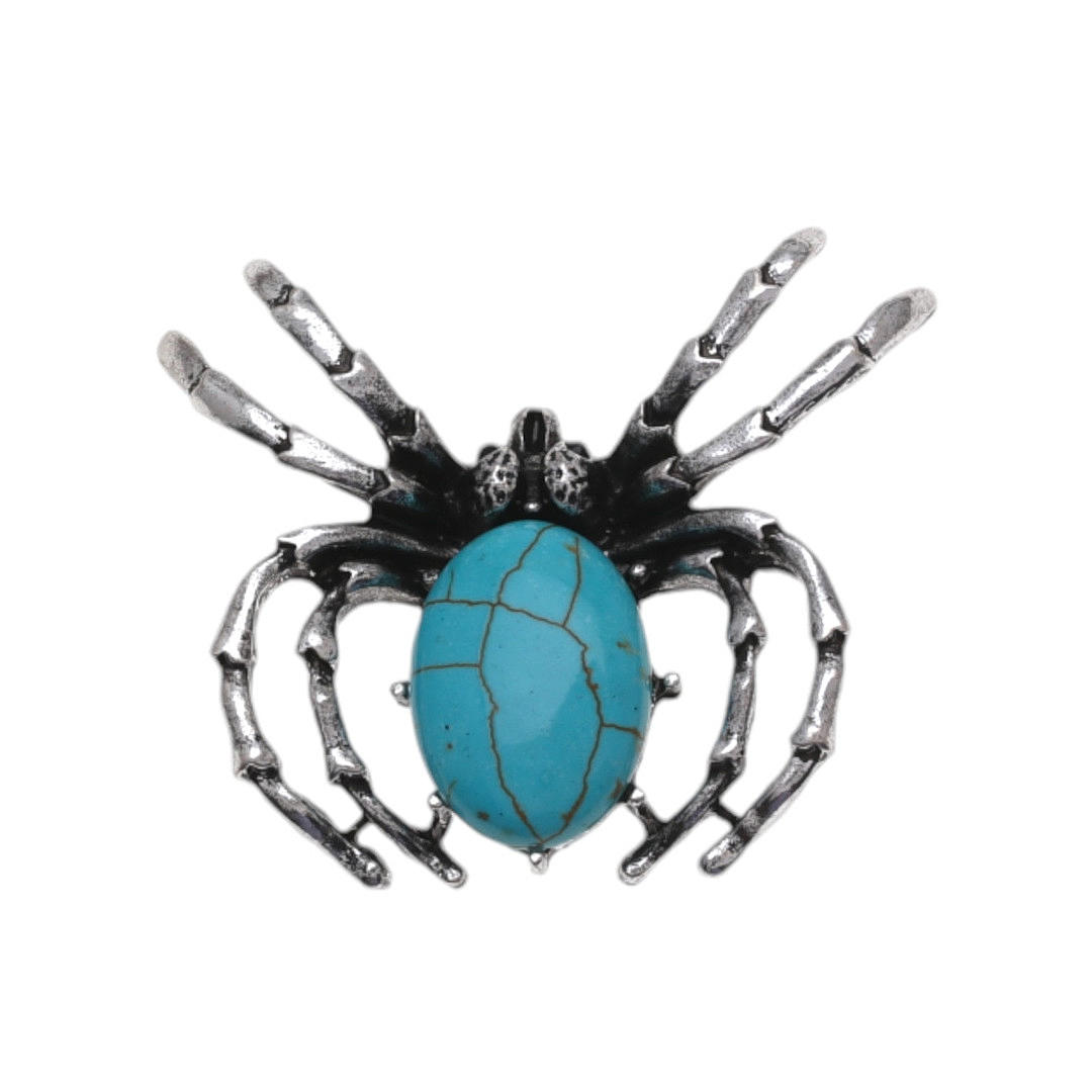 Spider-shaped brooch-pendant.