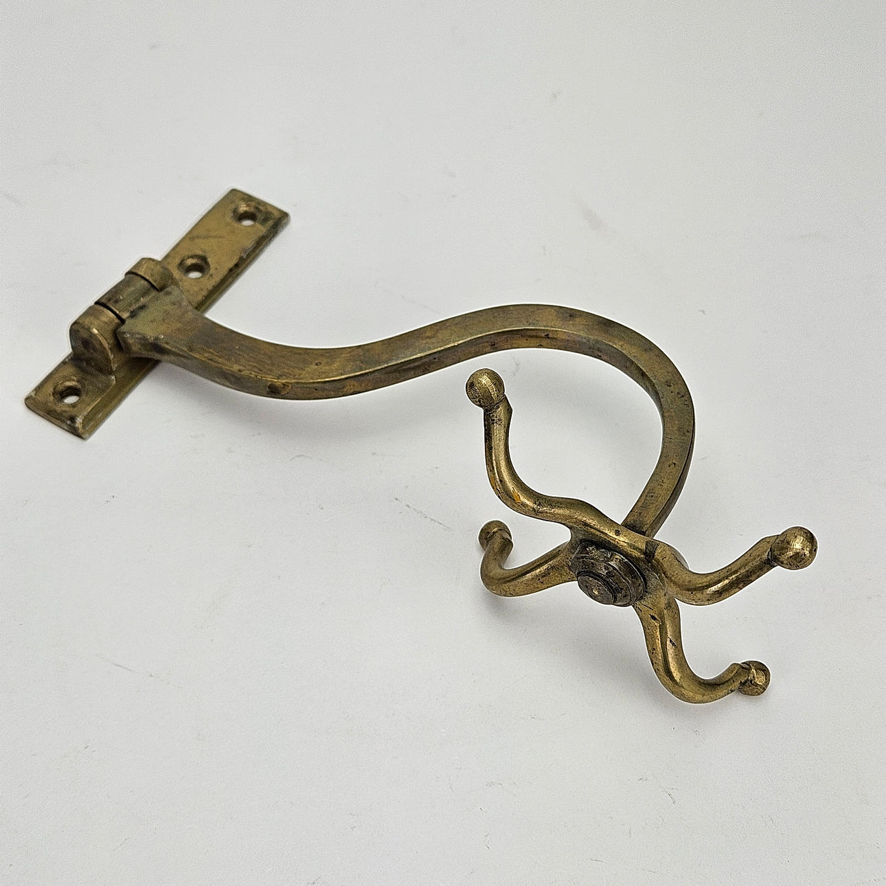 A 20th-century brass hanger.