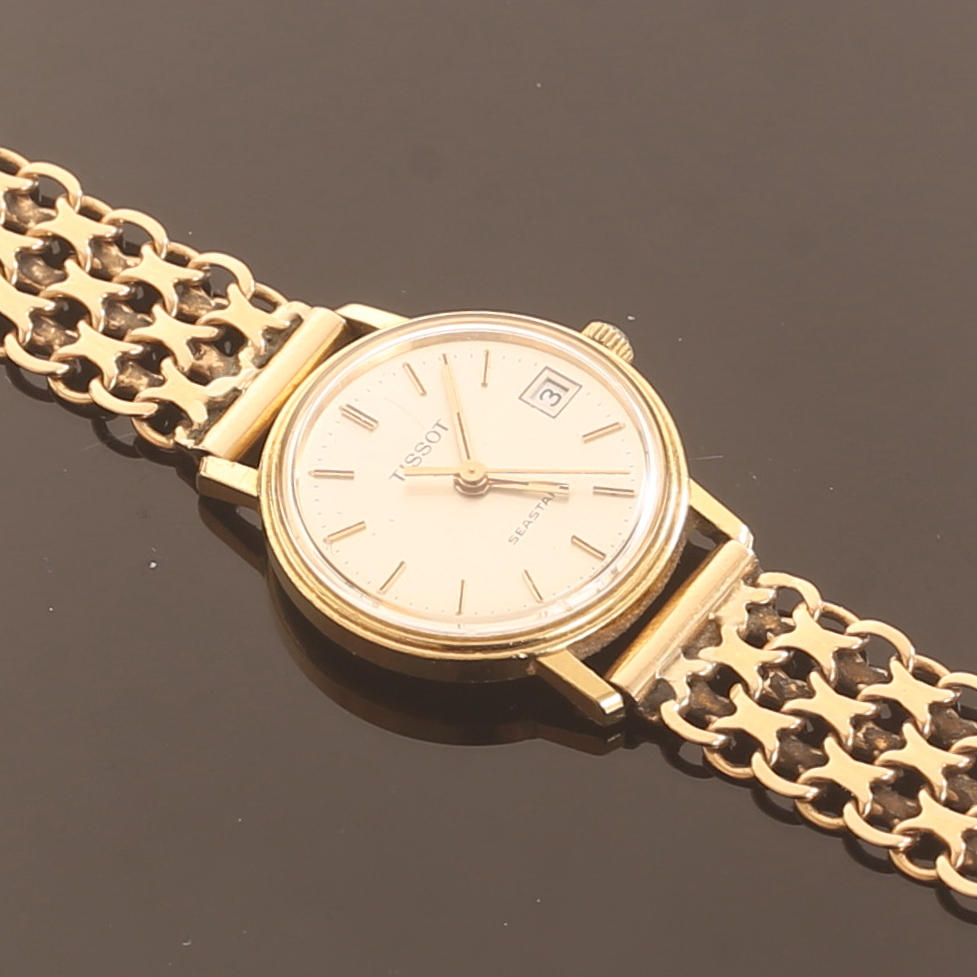 DAMARMBANDSUR, Tissot, 18 k guld.