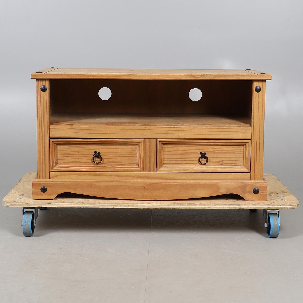 A MODERN PINE TV STAND.