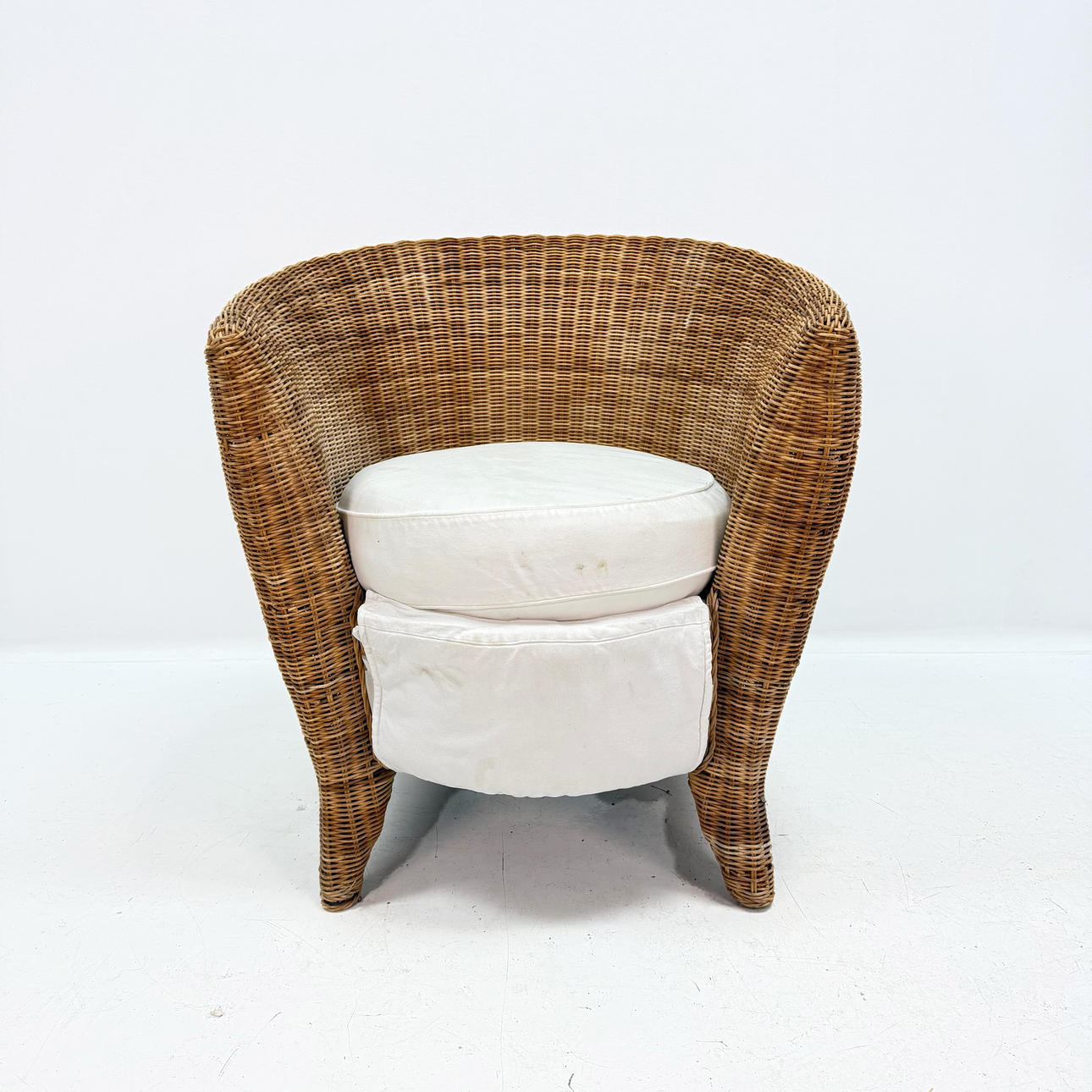 RATTAN ARMCHAIR with cushion.