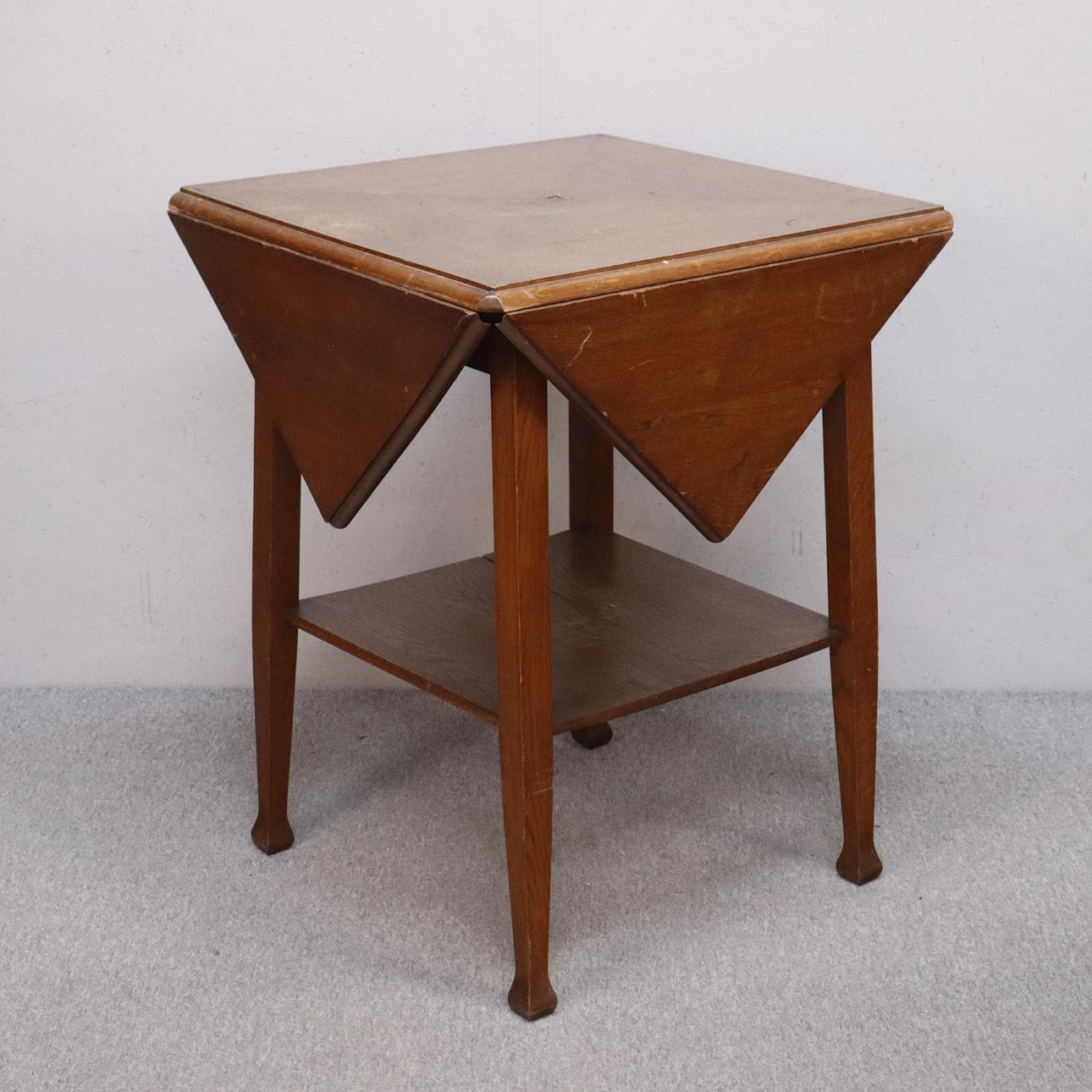 ENVELOPE TABLE with newspaper shelf, oak, first half of the 20th ...