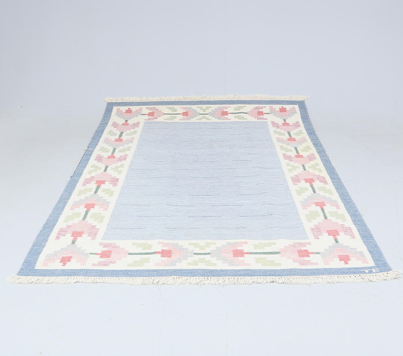 A carpet, yarrow linen, signed TE, 20th century.