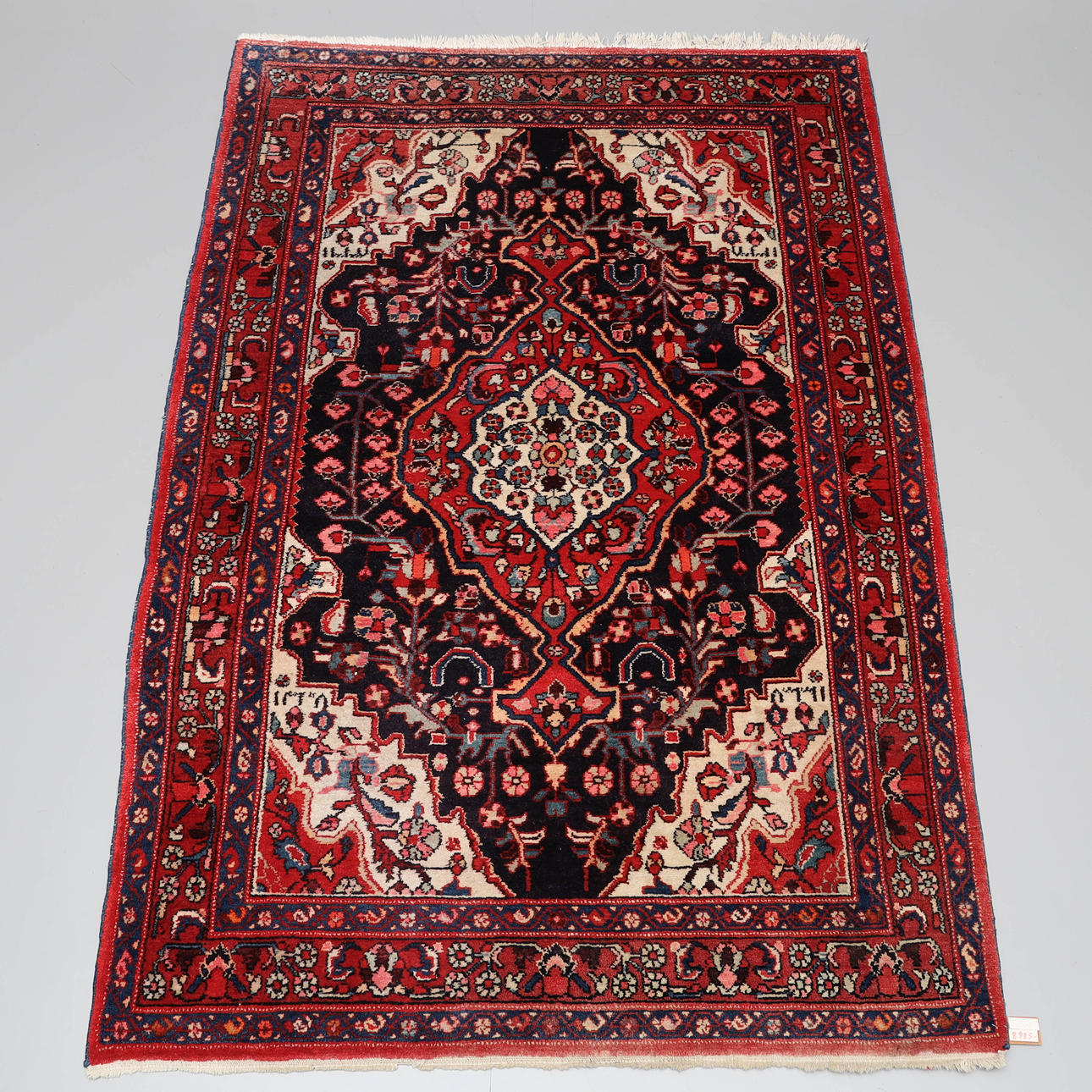 A hand-knotted, wool rug, Kolyai, Persian.