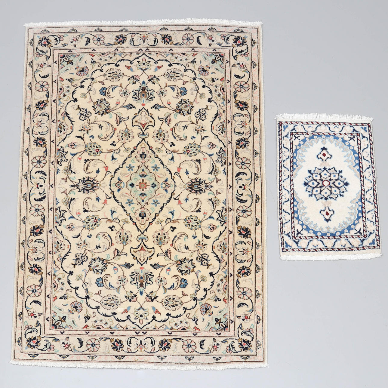 2 piece oriental rugs, hand-knotted, wool.