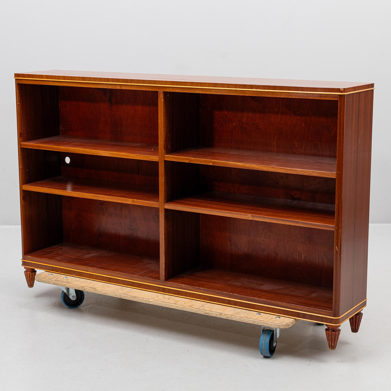 A 1930s mahogany bookcase.