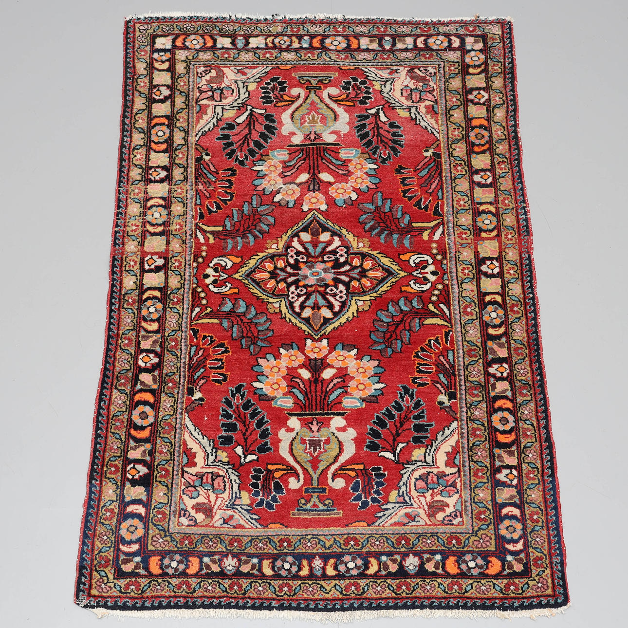 A carpet, hand-knotted, wool, Persian.