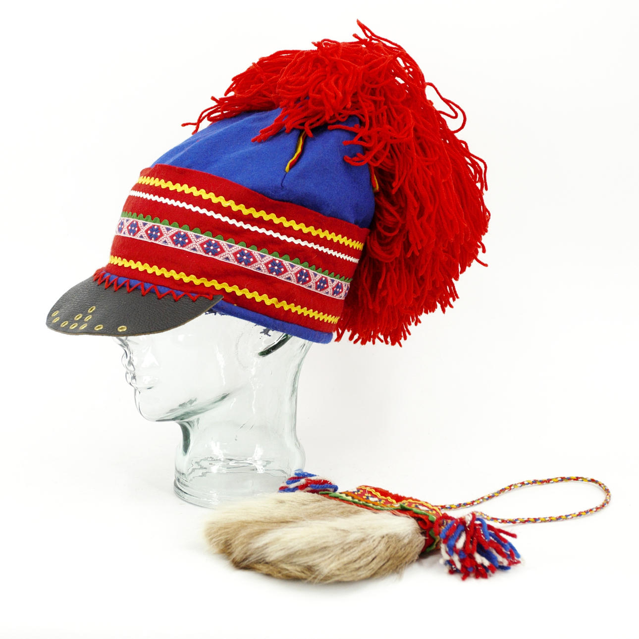 SKÄRMMÖSSA och VÄSKA, ull, renskinn, nutida.