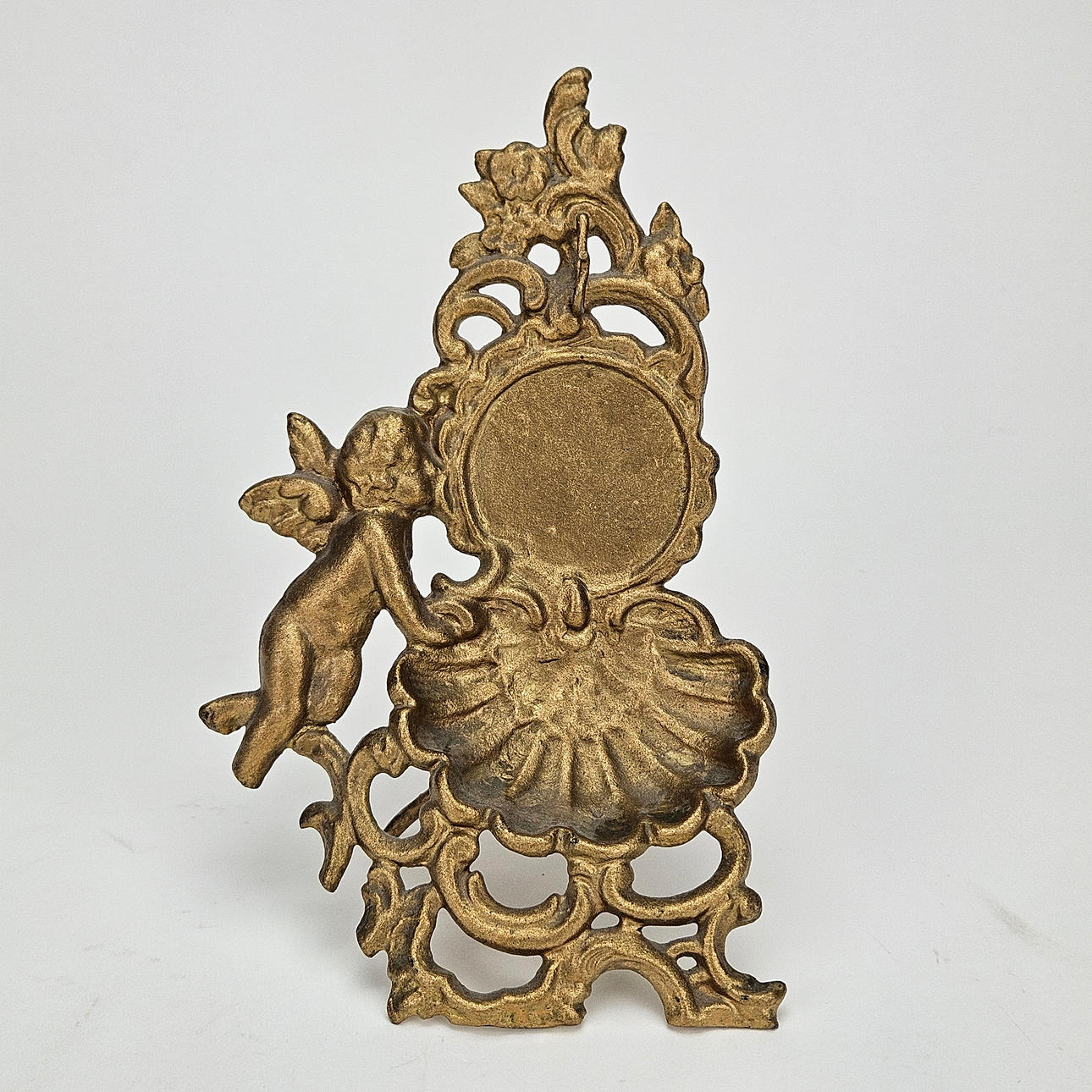 A Neo-Rococo metal clock stand, circa 1900.
