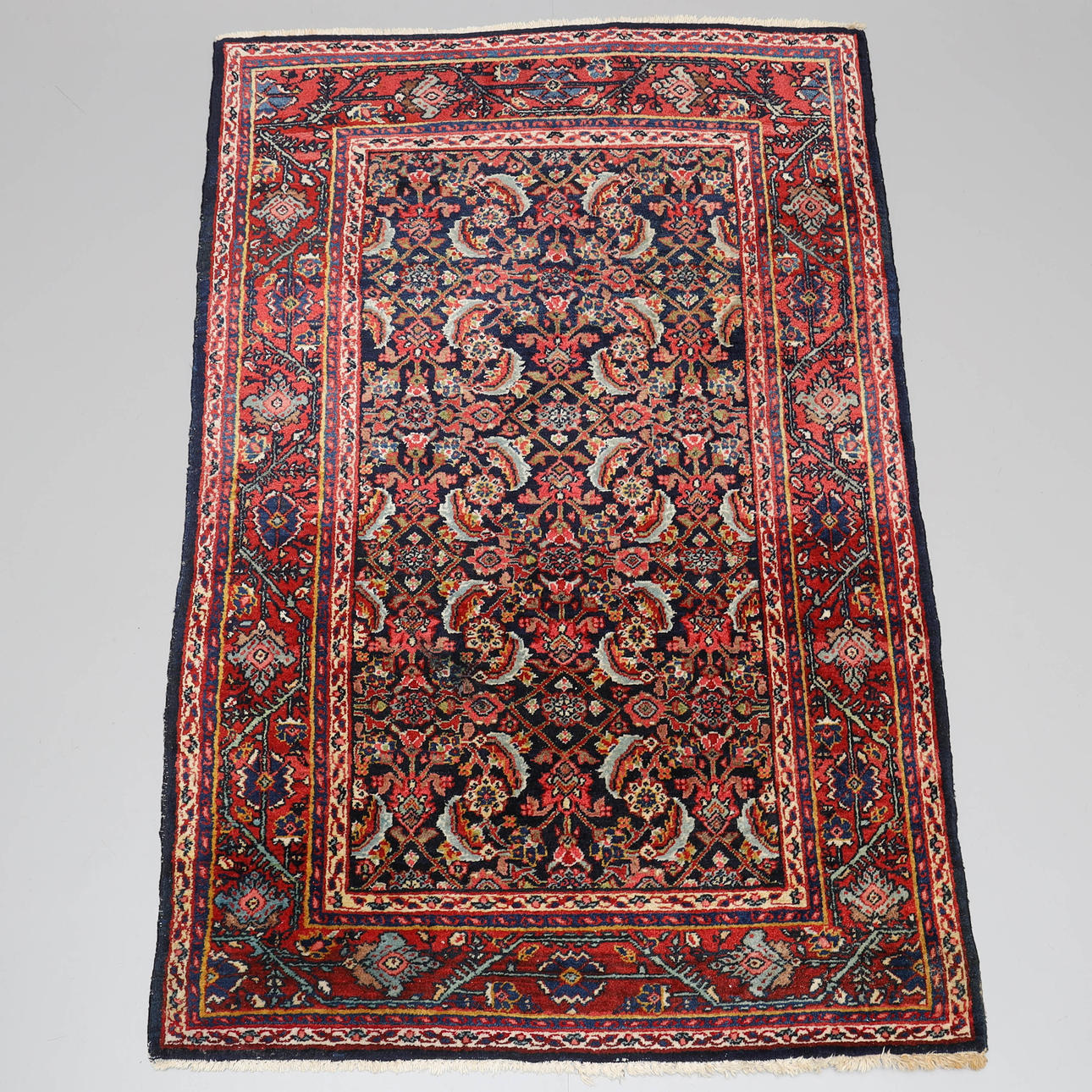 A carpet, hand-knotted, wool, Persian.