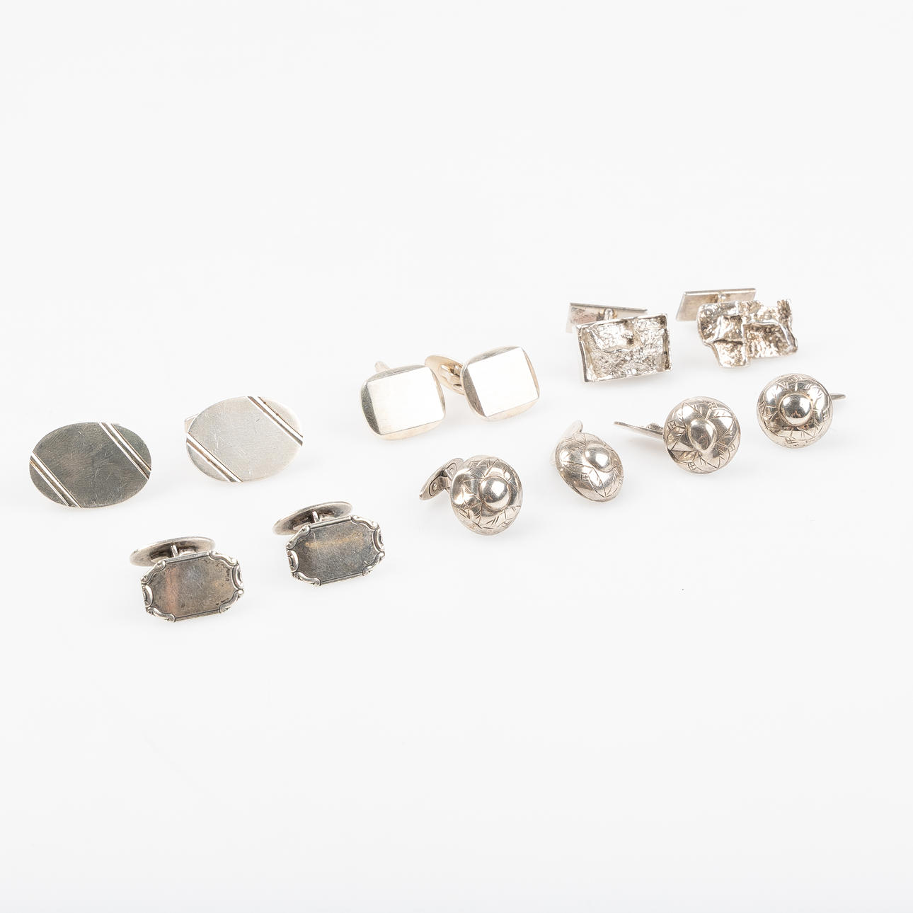 MANCHETTKNAPPAR, 6 par, silver. Bl.a. Nils Erik From.