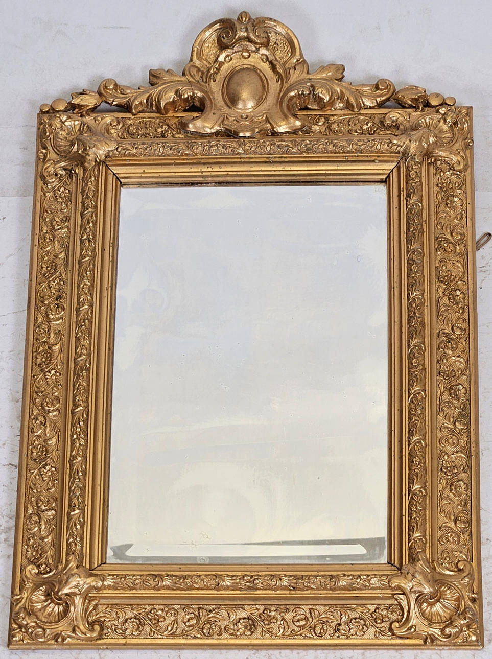 An Oscarian mirror, circa 1900.