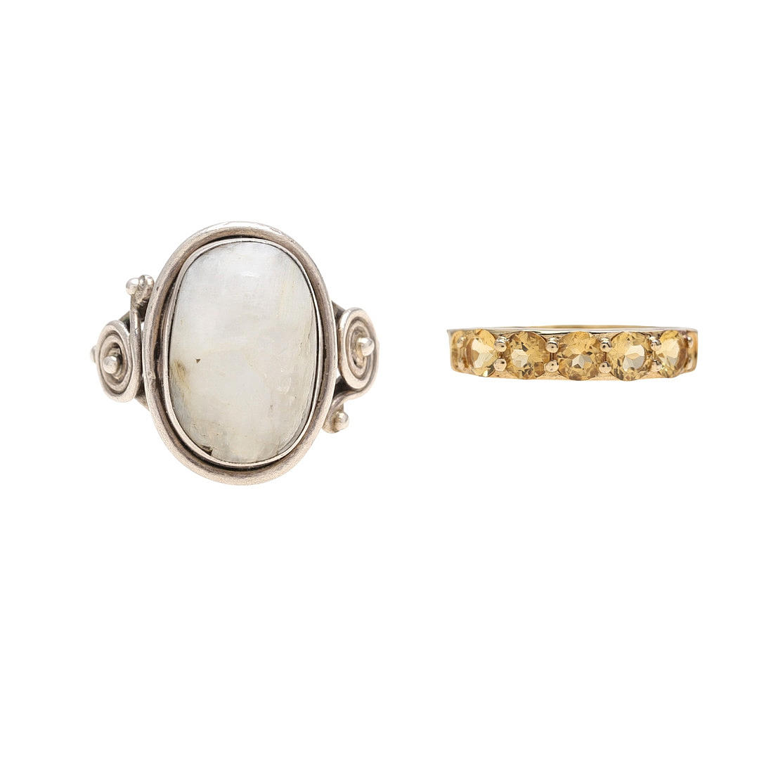 Two silver and gemstones rings.