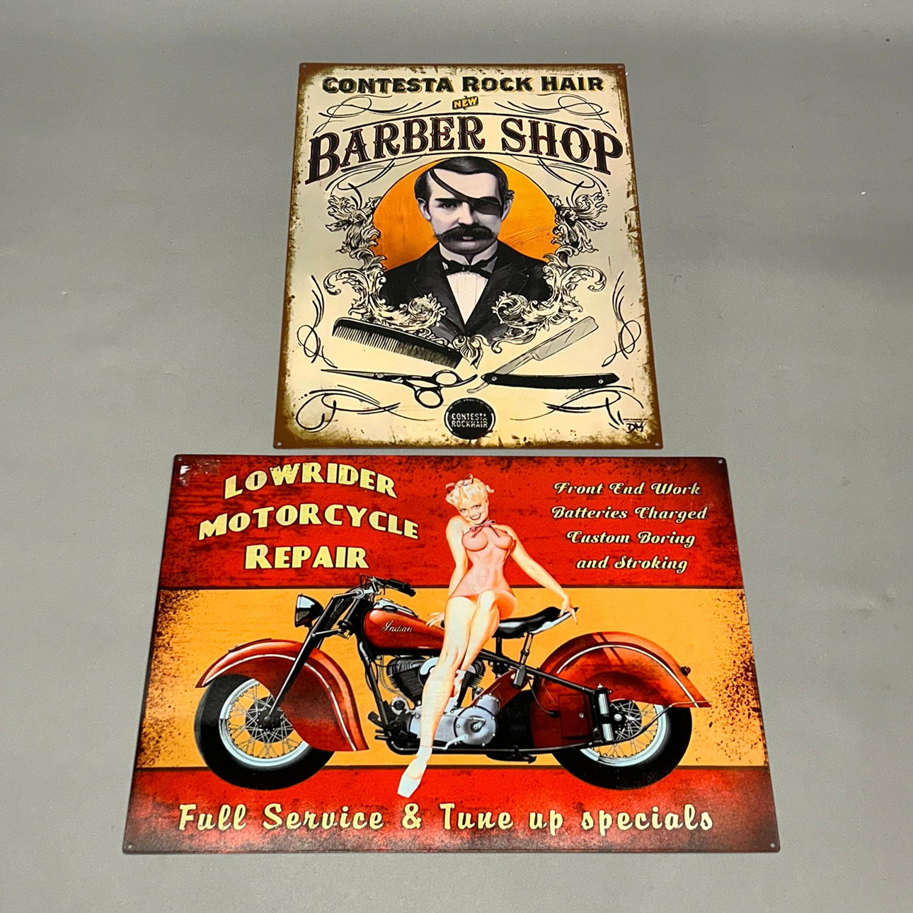 TWO TIN ADVERTISING SIGNS.