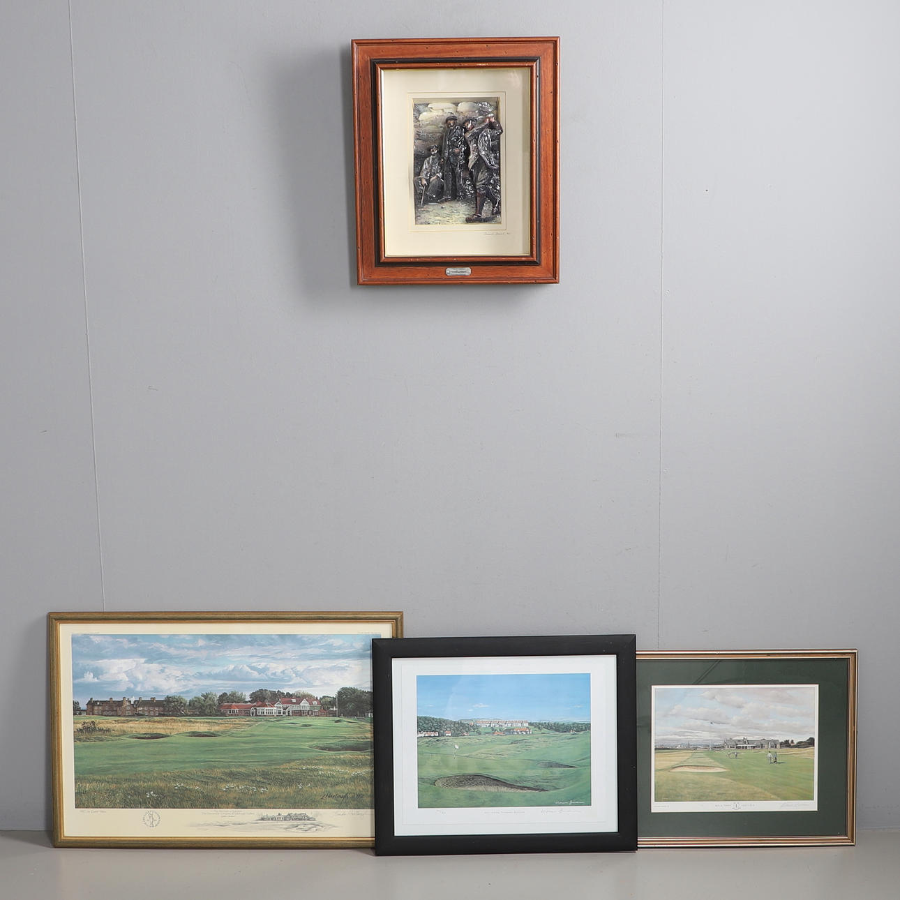 THREE FRAMED GOLFING PRINTS, AND A FRAMED SCULPTURE (4).