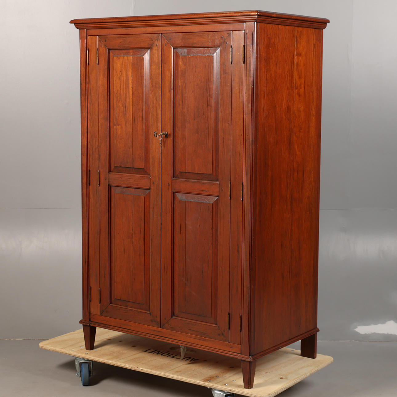 A 20TH CENTURY CONTINENTAL TV CABINET.