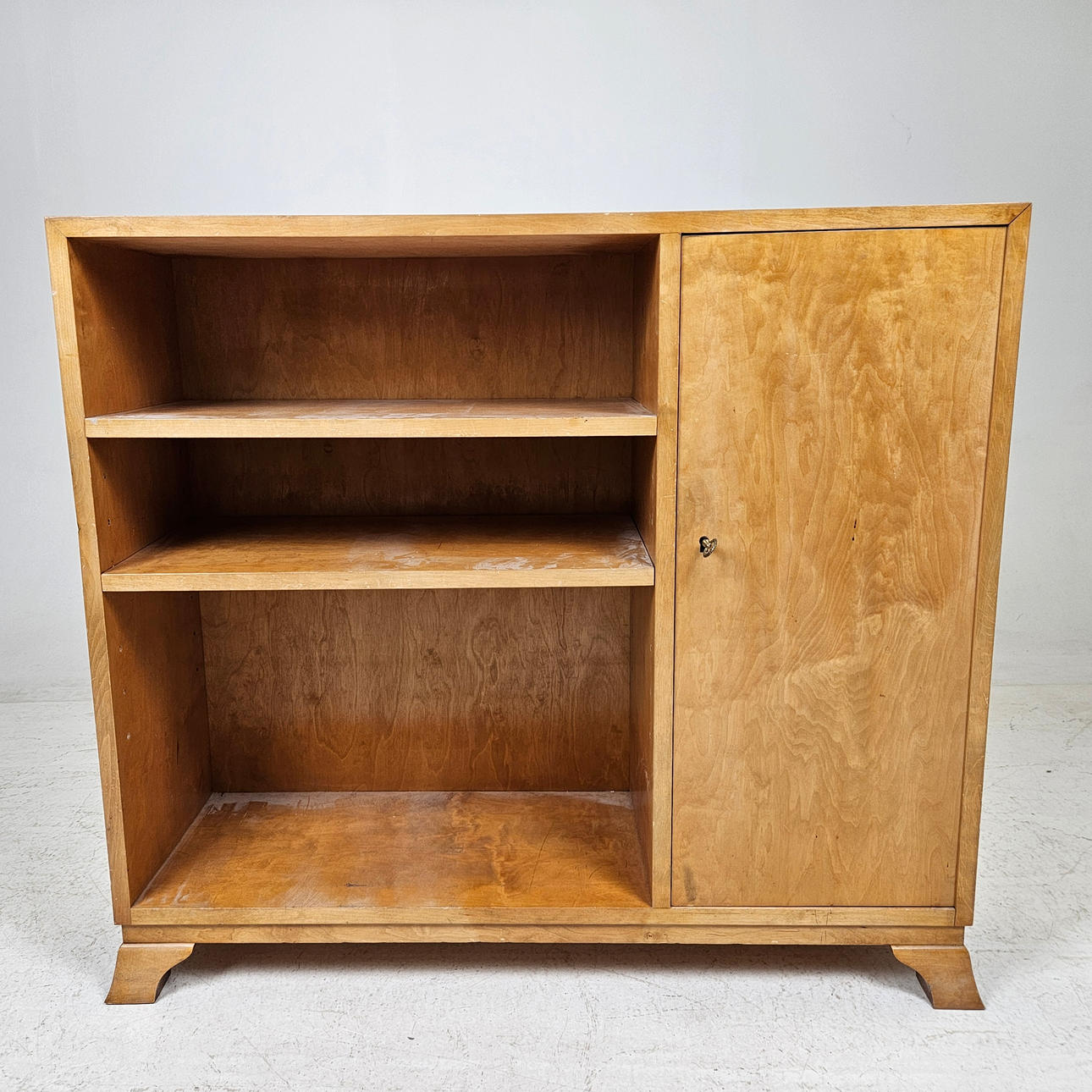 Bookcase with cupboard, 1940s.