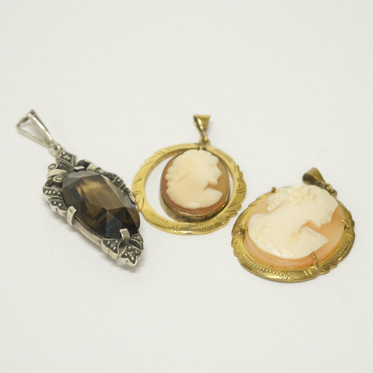THREE PENDANTS.