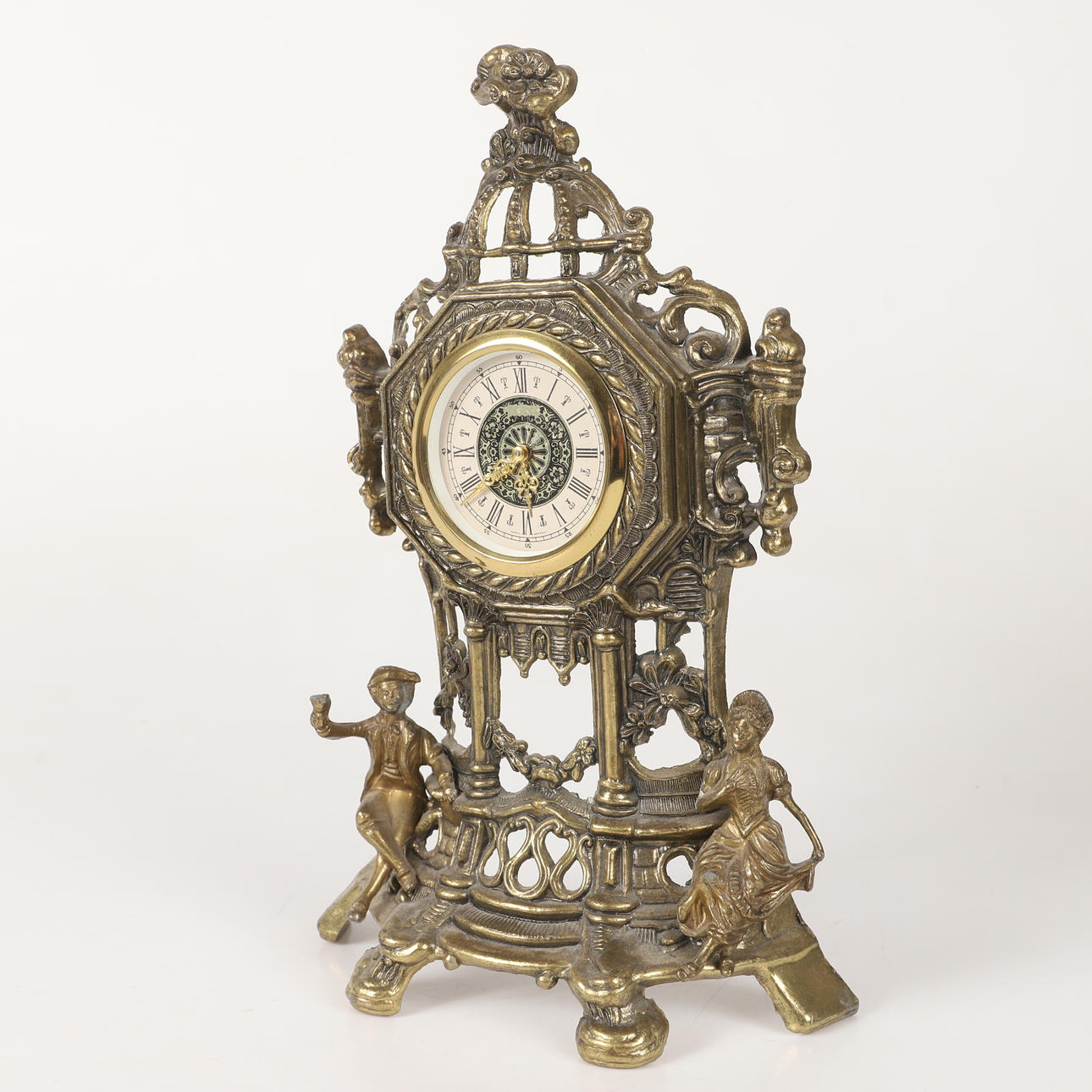 A metal table clock, 20th century.