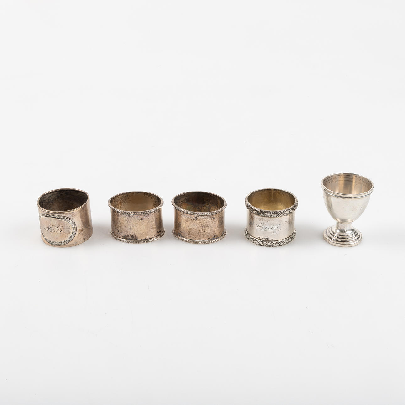 NAPKIN RINGS AND EGG CUP, silver, 5 dlr.
