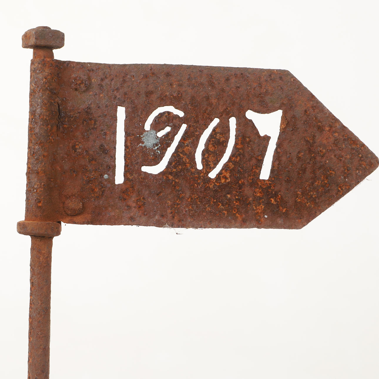 A WROUGHT WIND FLUTE, dated 1907.